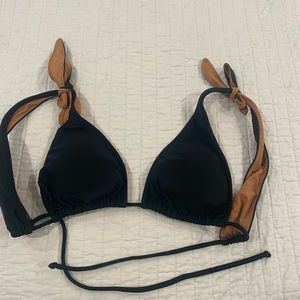 Black bikini top. Paula Hermanny. Size medium. No damage